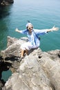 Travelers thai women people travel visit unseen trip at Ao Toa Ba beach and posing portrail take photo with stone sea Ã¢â¬â¹Ã¢â¬â¹heart Royalty Free Stock Photo